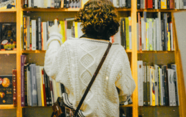 woman browsing bookstore