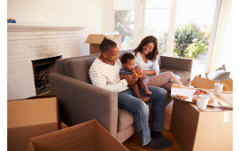 Family taking break while moving