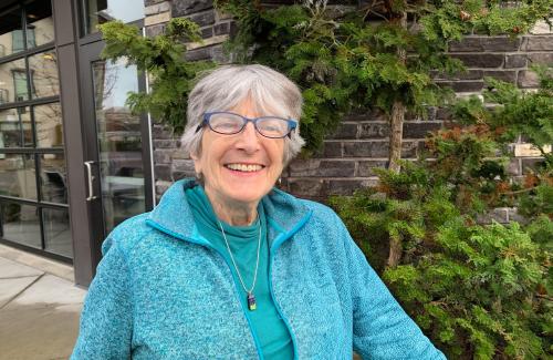 Artist smiles at camera