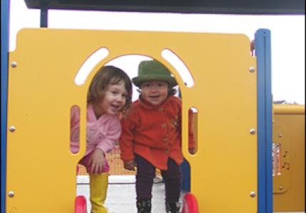  Sophia Navarro (left) and Hayden Benedict (right) on play structure