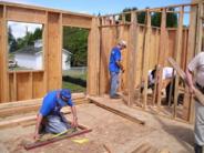 Volunteers working on the house