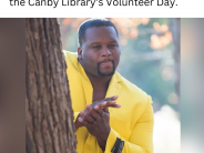 Anthony Adams hiding behind tree meme advertising volunteer day
