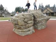 Children on climbing rock