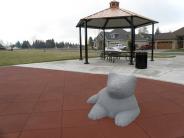 Cat statue and picnic shelter