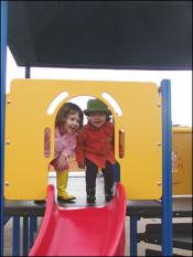 Sophia Navarro and Hayden Benedict at the top of the slide