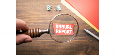 Magnifying glass with word annual report