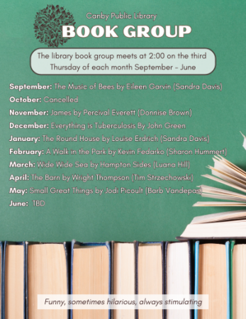 Dark green background with vertical pages of books facing the viewer and one book on top fanned open