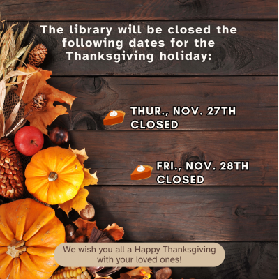 dark brown wooden slat backdrop with bright orange pumpkins and dried ears on corn scattered festively on the left side