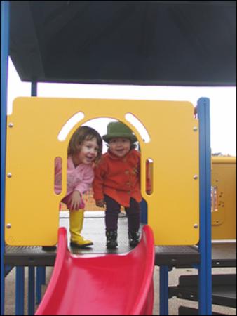  Sophia Navarro (left) and Hayden Benedict (right) on play structure