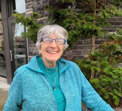 Artist smiles at camera