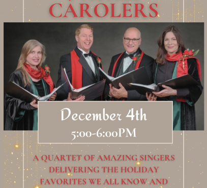 a quartet of singers in black suits and dresses with red and green ties