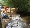 Volunteers working on a stone trail